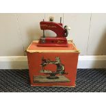 Two children’s sewing machines, one Vulcan Junior, one E.L. Grain.