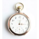 An Alpine open face crown wind pocket watch, the white enamel dial having hourly Arabic numeral