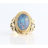 An opal doublet ring, set with an oval opal doublet measuring approx. 14x9mm, with open metalwork