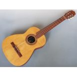 A BM Clasico acoustic guitar, made in Spain.