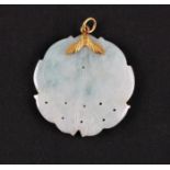 A green jadeite jade pendant, engraved with fish design, unmarked yellow metal mount, diameter