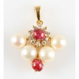 A ruby, diamond and pearl pendant, the triangular design set with two ruby cabochons, one surrounded