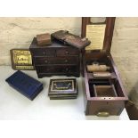 A Gledhills patent No. 60901 cash till, with a wall hanging miniature chest of drawers, two money