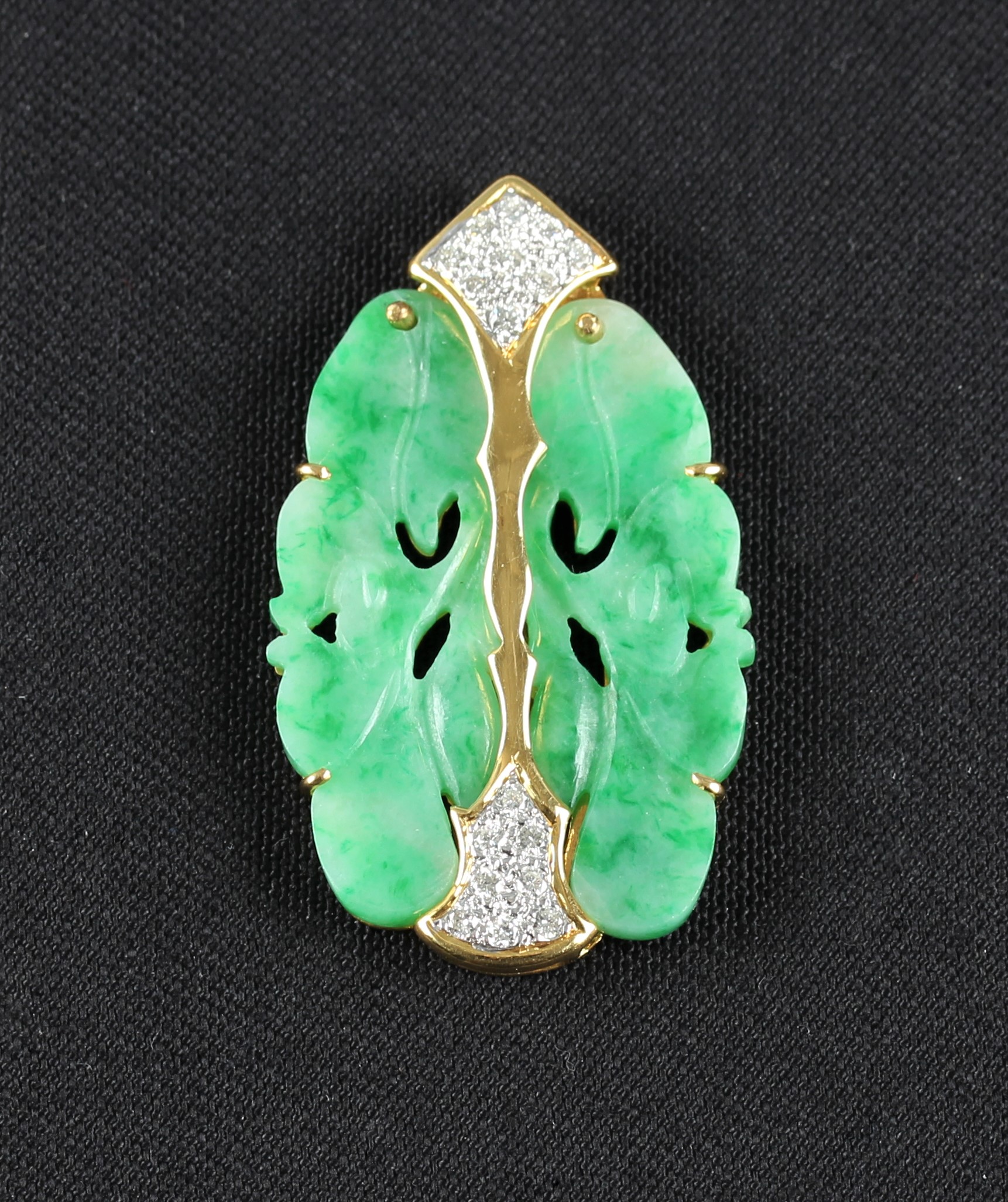 A carved jade and diamond plaque pendant, featuring a carved piece of green jade mounted in yellow - Image 2 of 2