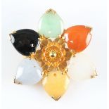 A multi-coloured carved hardstone brooch, featuring six pieces of carved hardstone in a flower