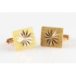 A pair of rectangular bright cut engraved cufflinks, both stamped 22K with additional Chinese