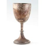 A Victorian silver goblet, the plain tapered bowl raised on a knopped stem and circular foot,