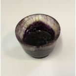 A miniature blue John carved pot, height 3cm, diameter 3.5cm.