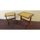 A G-plan nest of three teak tile topped tables.