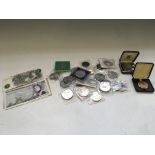 A selection of various coins including 1953 Coronation medal, Royal Mint 1973 fifty pence and 1996
