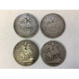 Four George III silver crowns, dated 1819, 1820, 1821 and 1822.