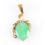 A green jadeite jade pendant, set with an oval jadeite cabochon, measuring approx. 14x11mm, set in a