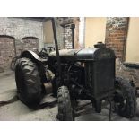 A Fordson Ford Major Company tractor, grey painted, with hand crank start to front.