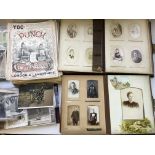 Two albums of Victorian portrait photographs, together with an album of postcards, other loose