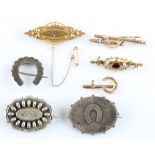 A collection of brooches, two gemstone set and stamped 9ct, a two bar design brooch (A/F) and