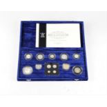 A Royal Mint UK Millennium silver collection of coins.