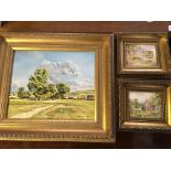 Three framed pictures, one oil on canvas by Alfred J Ash, dated 1980, with two rural scenes