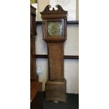 An oak silvered and brass faced Samuel Butterworth long cased clock.
