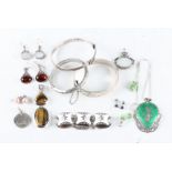 A collection of white metal jewellery, to include three bangles, a Siamese enamel pendant and