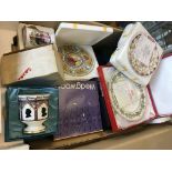 A box of various commemorative ware, including Spode plate, Coalport cup, Wedgwood, etc.