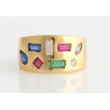 A multi-gemstone ring, the tapered band design set with variously cut rubies, synthetic blue spinel,
