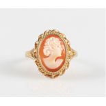 A hallmarked 9ct yellow gold cameo ring, set with an oval cameo depicting a lady's portrait in