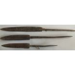 Three Oceanic paddle-shaped spear heads lengths 57cm, 75cm and 80cm. IMPORTANT: Online viewing and