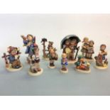 Ten Goebel Hummel figurines. IMPORTANT: Online viewing and bidding only. No in person collections,