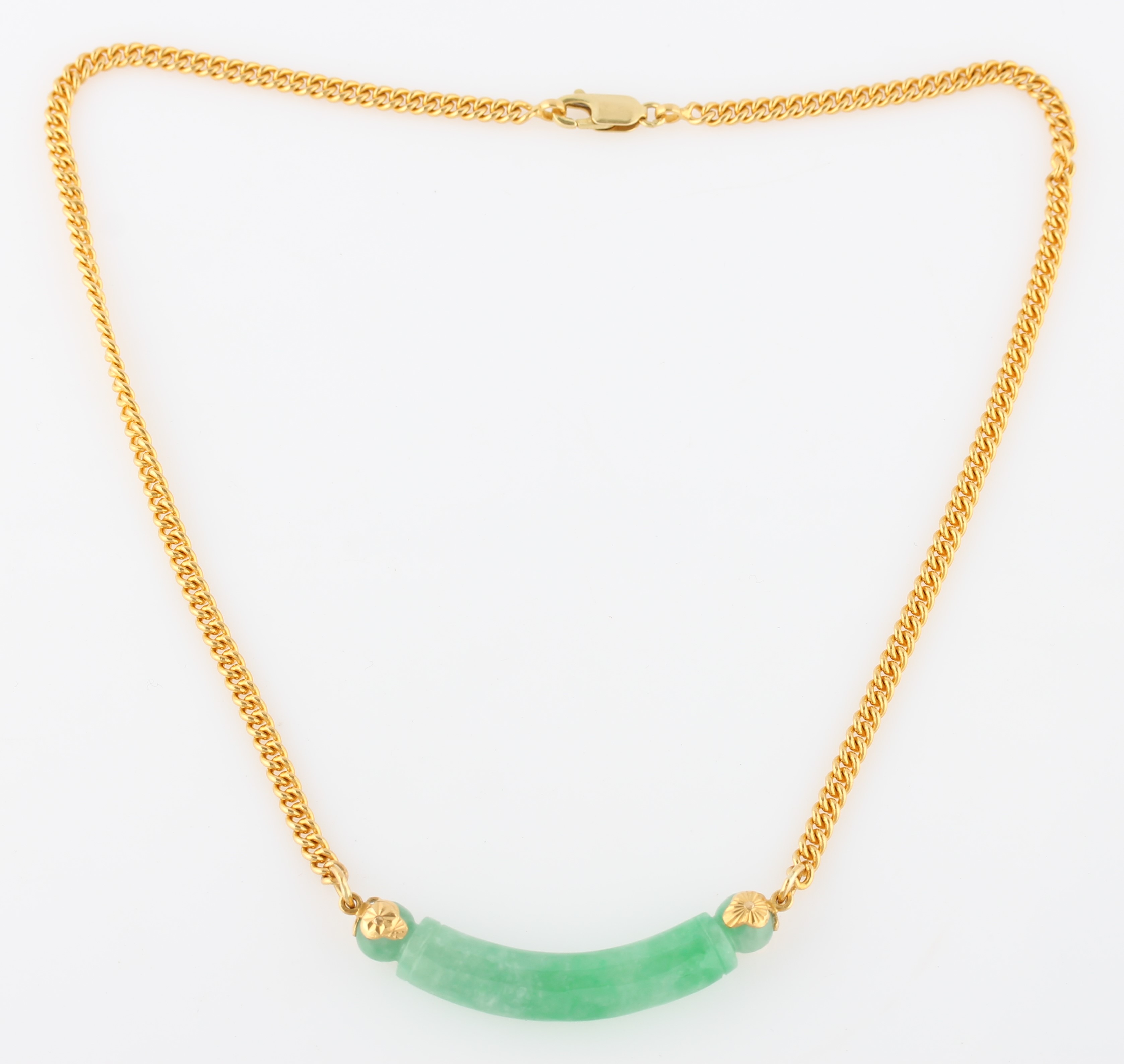 A green jade necklace, comprising a curved piece of carved jade attached to a belcher link chain, - Image 2 of 2