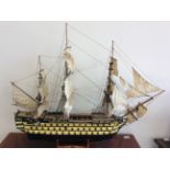 A large model of HMS Victory, length sail to sail approximately 92cm. IMPORTANT: Online viewing