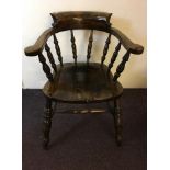 Eight tub captain chairs with spindle backs. IMPORTANT: Online viewing and bidding only. No in