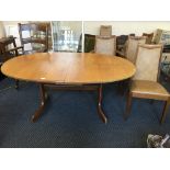 An extending dining table with six leather seated chairs. IMPORTANT: Online viewing and bidding