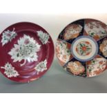 Two large Japanese wall plates decorated with cranes and butterflies, diameters 35cm and 38cm.