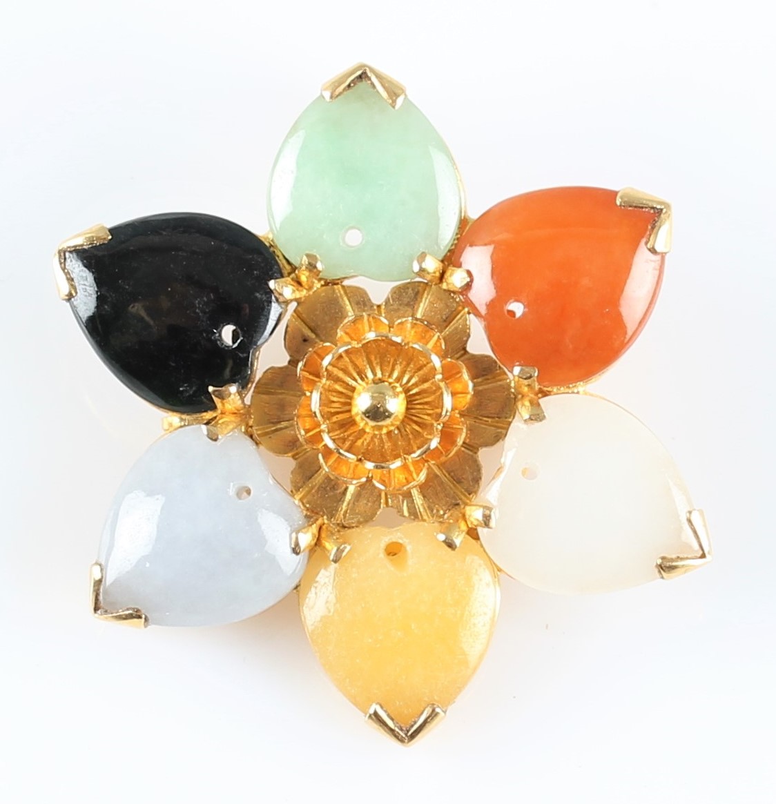 A multi-coloured carved hardstone brooch, featuring six pieces of carved hardstone in a flower