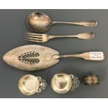 A George III silver fish server hallmarked London 1802, a Georgian fork, hallmarked London assay,