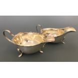 Two silver sauce boats, one hallmarked Sheffield 1933, the other Birmingham 1933, total weight