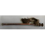 A New Hebrides Vanuatu war club, with mushroom head on collar of carved knobs, plaited rope to