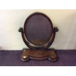 A mahogany Victorian large free standing oval mirror, height 88cm. IMPORTANT: Online viewing and