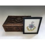 A carved oriental dragon design 6th Royal Sussex Regiment box, with embroidered framed crest.
