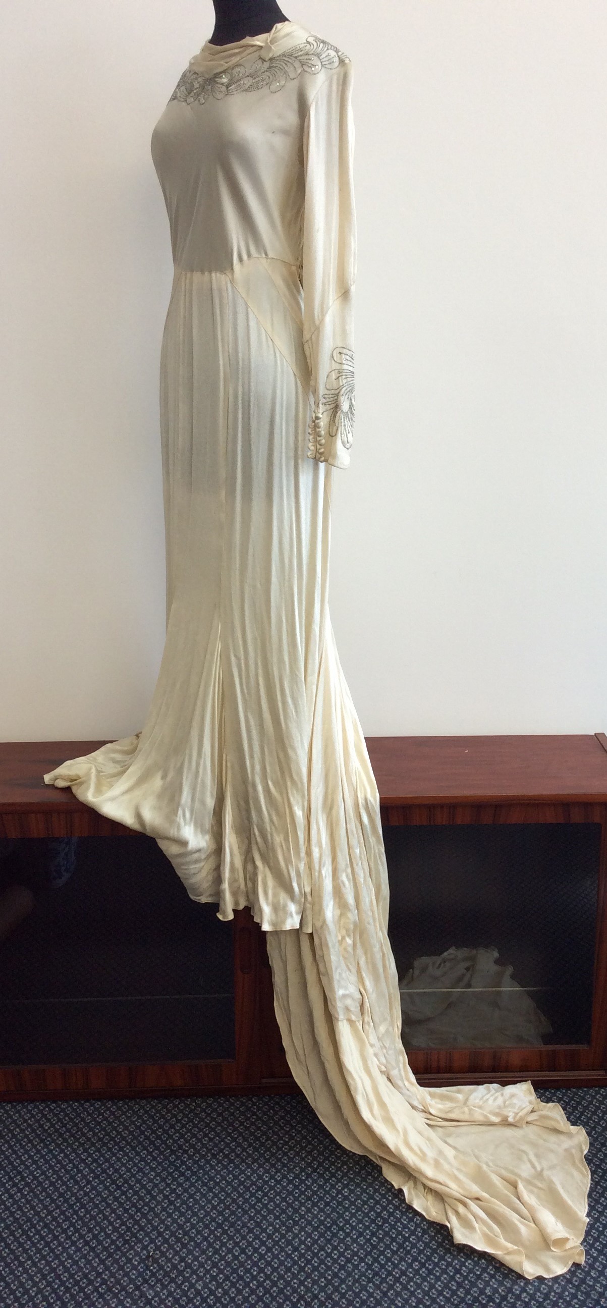 Early 20th century cream wedding dress with silver sequin design. IMPORTANT: Online viewing and