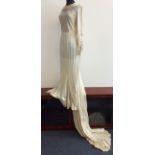 Early 20th century cream wedding dress with silver sequin design. IMPORTANT: Online viewing and