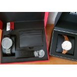 *Two Hugo Boss wrist watches, one being a ladies example numbered 'HB.322.3.34.3066' with box, outer