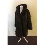 Two fur coats, brown and white, with one shawl. IMPORTANT: Online viewing and bidding only. No in