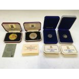 Four Pobjoy Mint proof coins, including Margaret Thatcher 1979 gold plated silver crown medal,