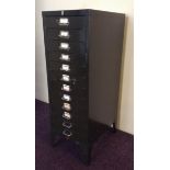 A green painted 12 drawer metal filling cabinet. IMPORTANT: Online viewing and bidding only. No in