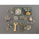 Ten Jonette Jewelry gardening pin brooches, some with hanging charms, with three pin badges,