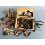 A box containing various smoking pipes, some cased, pipe holders, boxes, etc. IMPORTANT: Online