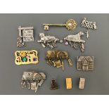 Eleven Jonette Jewelry pin brooches, with one pin badge, including house sold and for sale, cat, dog