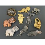 Ten Jonette Jewelry Company safari animal pin brooches, including tigers, elephants, gorilla, monkey