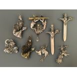 Eight Jonette Jewelry pin brooches, including wizard with sword, wizards with orbs, witch in